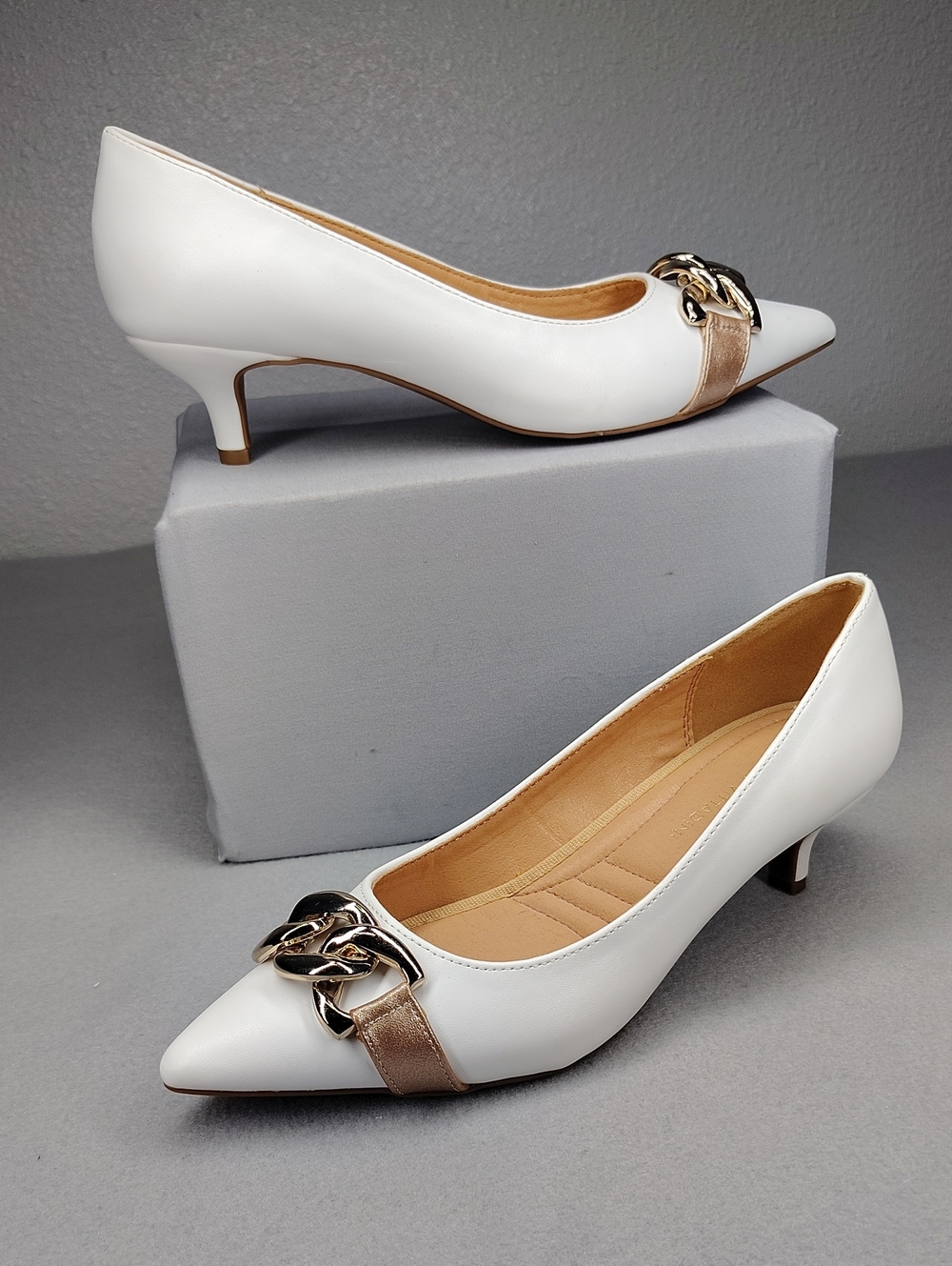 Adrienne Vittadini White Kitten Heels Rose Gold Accents Holding Gold Chain